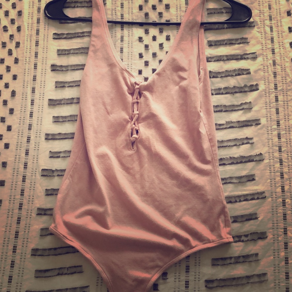 Pink laced up bodysuit